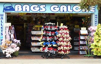 Front of shop displaying goods on offer