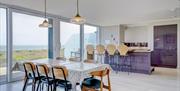 Open plan kitchen area overlooking beach views